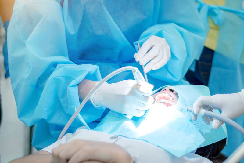 dental patient undergoing oral surgery