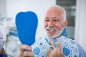 Dental Implant Patient Smiling After Procedure