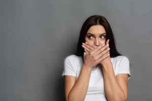 Dental Patient Hiding Her Missing Tooth