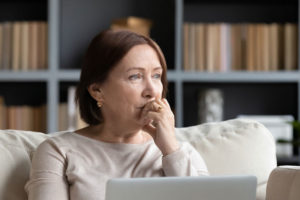 Dental Patient Wondering If She Should Get Dental Implants Or Dentures in Woodbury, MN