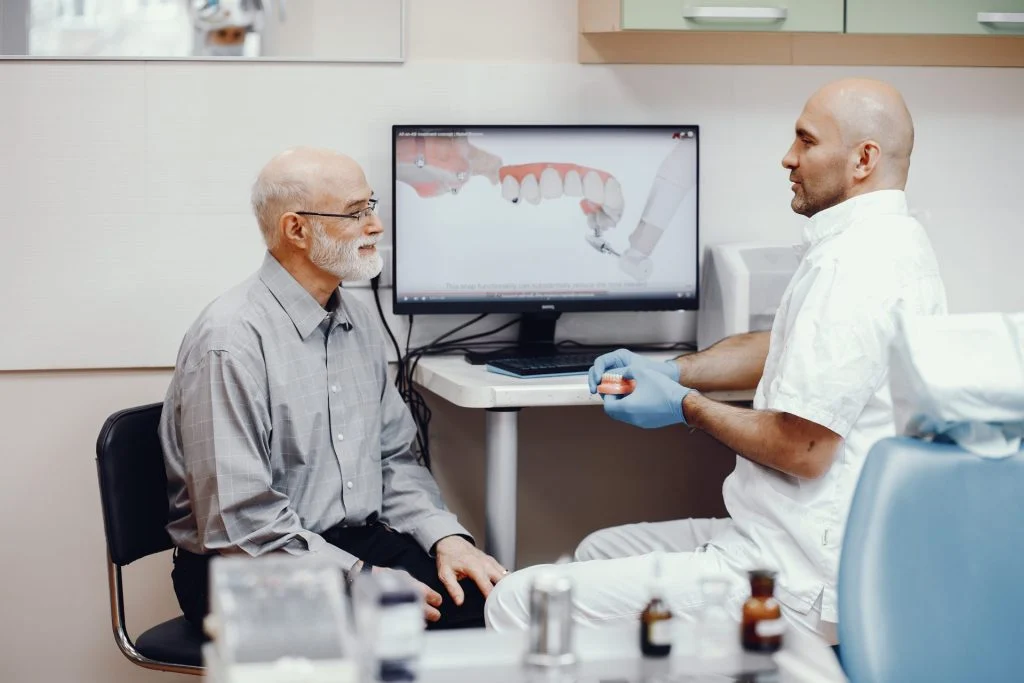 old man sitting dentist s office 6